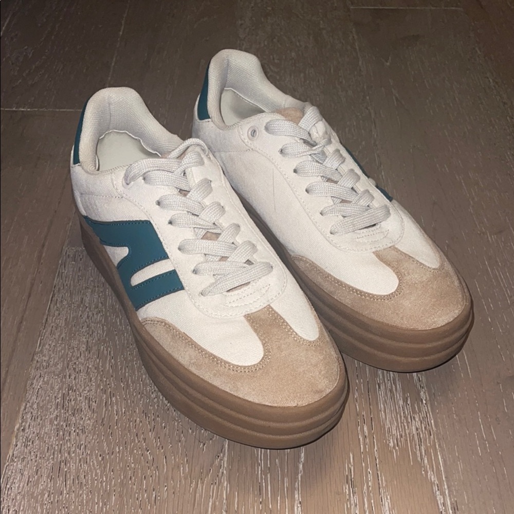Stylish White and Tan Sneakers with bold green stripe, platform rubber sole